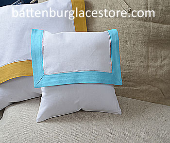 Envelope pillow. 8 inches. White with Aqua color border.